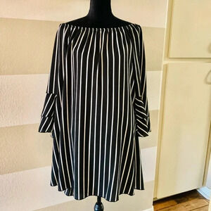 Vibe boutique black and white striped off the shoulder dress
